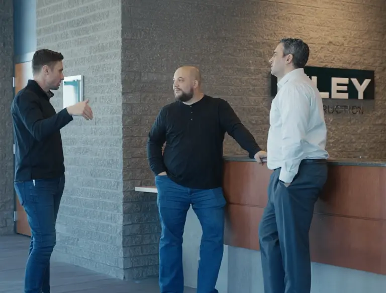 Riley Construction team members at their office